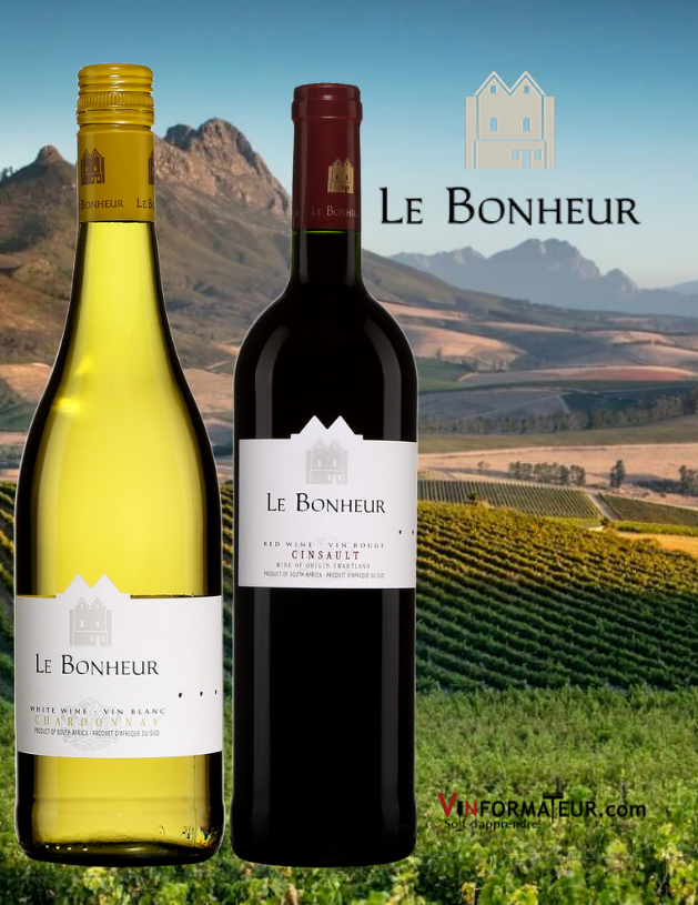 Bouteilles de Le Bonheur Chardonnay 2020 et Cinsault 2019 avec vignoble en arrière-plan